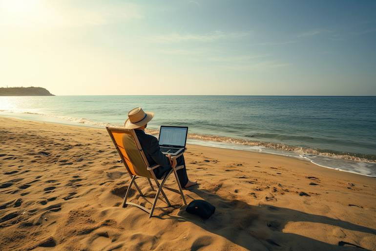 computer working on beach