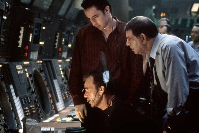 John Cusack as an air traffic controller, film Pushing Tin.