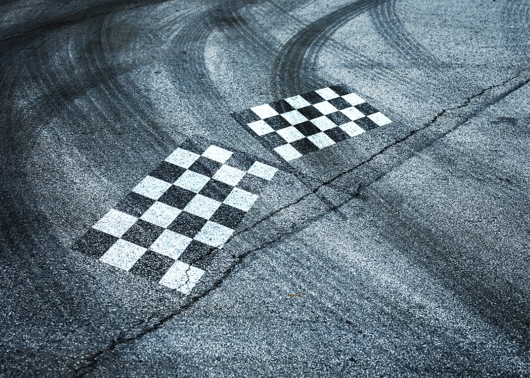 two flags on the ground for airwallex mclaren competition