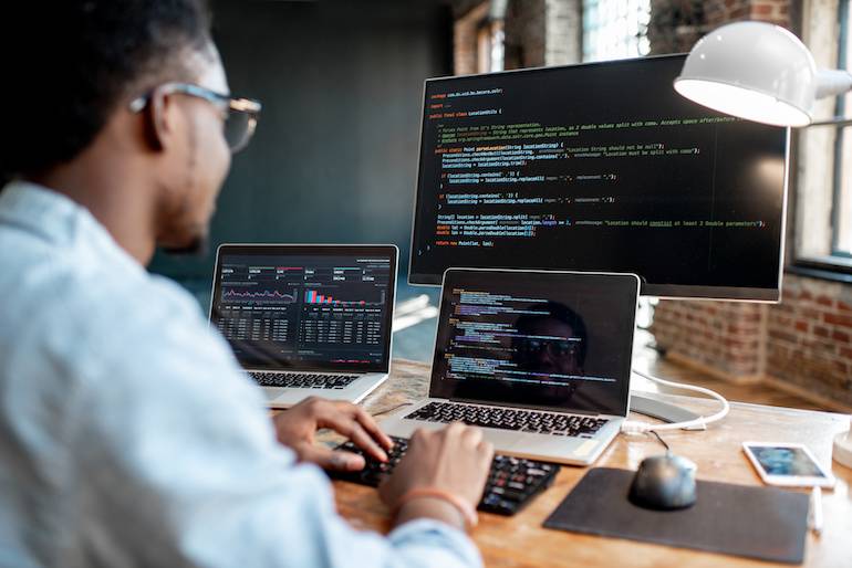 programmer writing program code